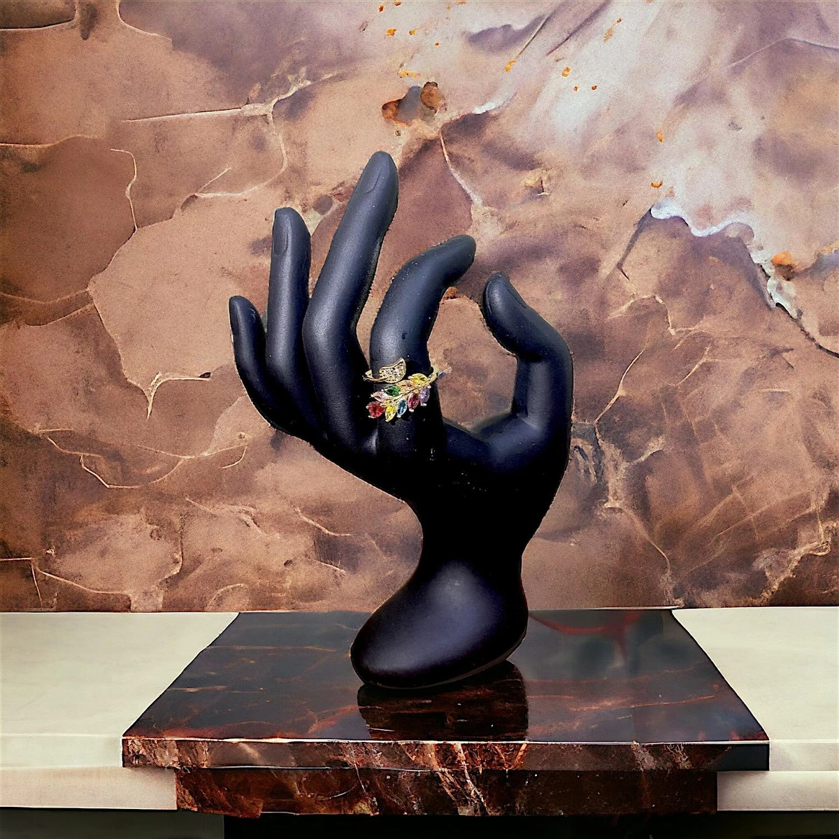 Golden Radiance: Exquisitely Crafted Ring Adorned with Multicolored Gemstones in an Intricately Detailed Design