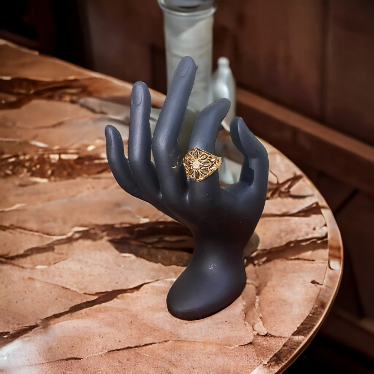 An Exquisite Golden Ring with Intricately Crafted Floral Design, Radiating Elegance and Sophistication
