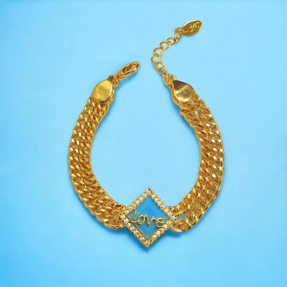 Radiant Affection: A Golden Bracelet Adorned with a Sparkling Pendant of Eternal Love
