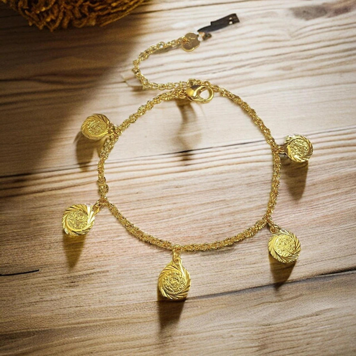 Celestial Splendor: A Golden Symphony of Intricately Crafted Charms, Radiating Elegance and Sophistication