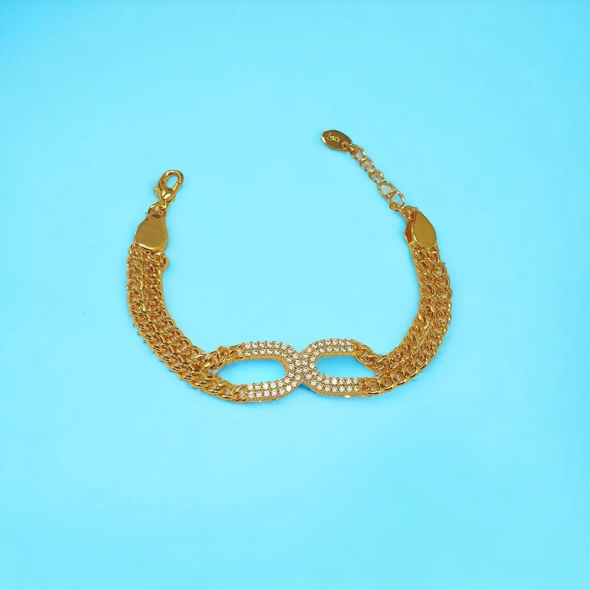 Timeless Treasures: Golden Infinity Symbol Bracelet with Sparkling Accents
