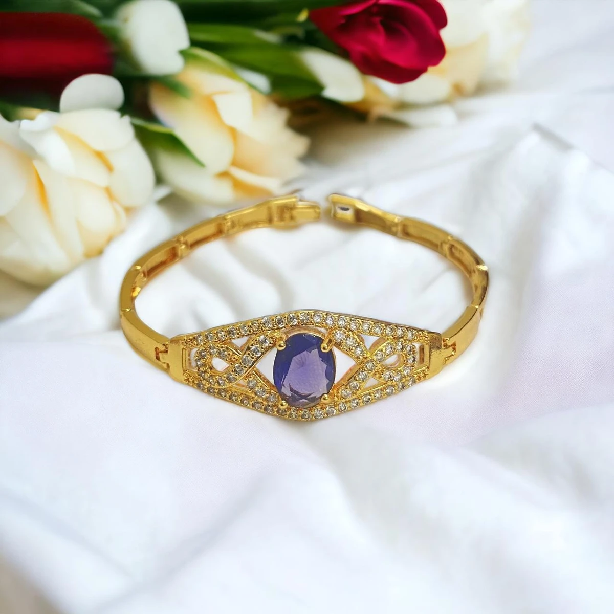 Golden Symphony: Exquisite Imitation Gold Bracelet with Intricate Designs and Captivating Gemstone, a Testament to Meticulous Craftsmanship and Timeless Beauty