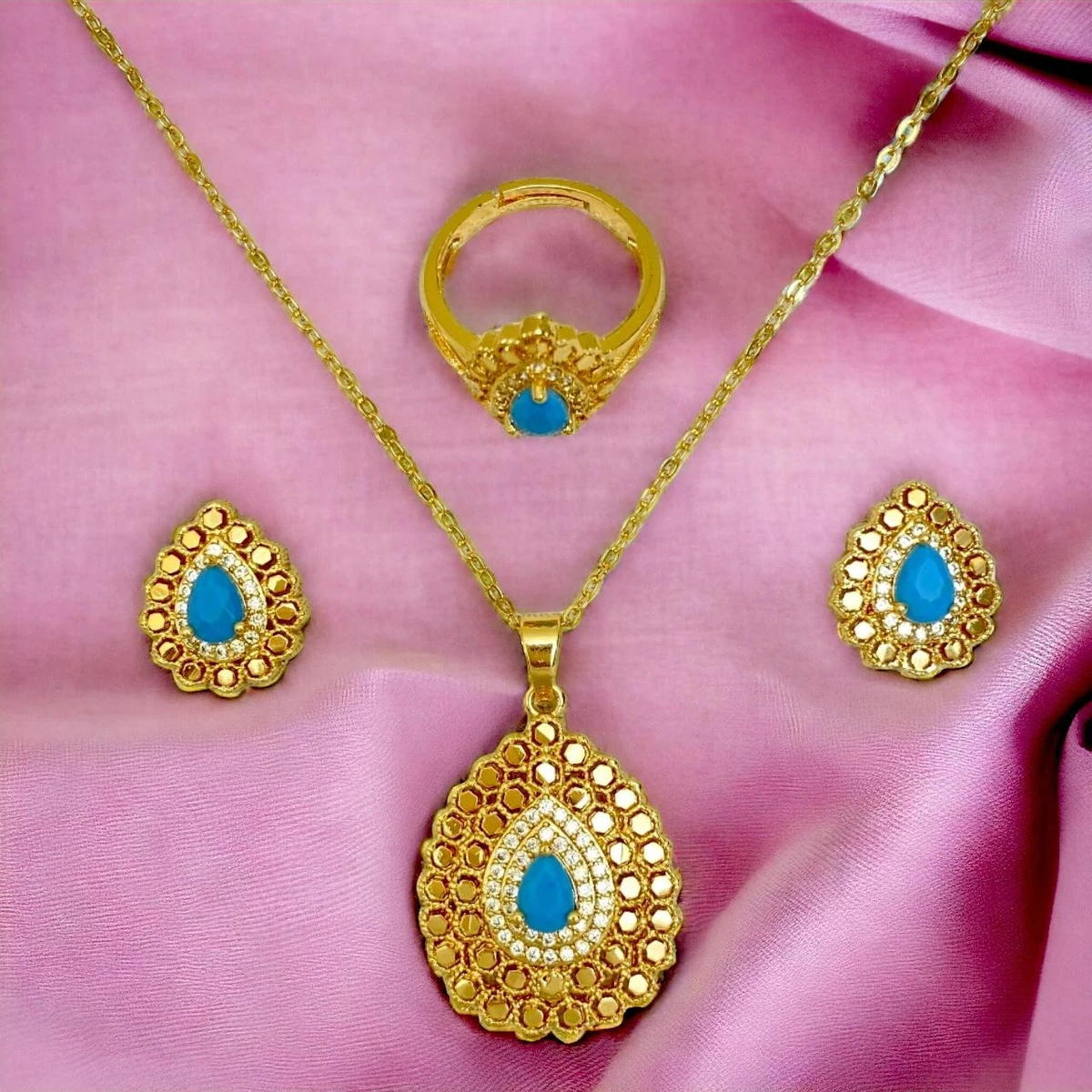Golden Aura: Luxurious Jewelry Collection Embellished with Intricate Designs and Prominent Gemstones