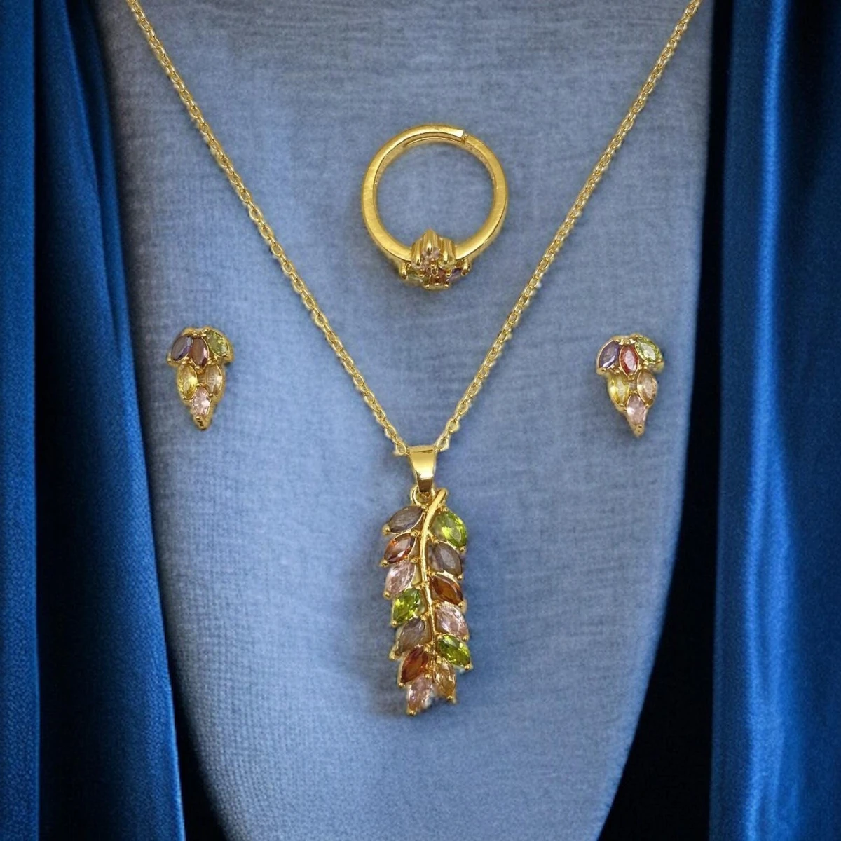 Jeweled Symphony: A Vibrant Collection of Exquisite Ring, Necklace, and Earrings, Adorned with Colorful Gemstones