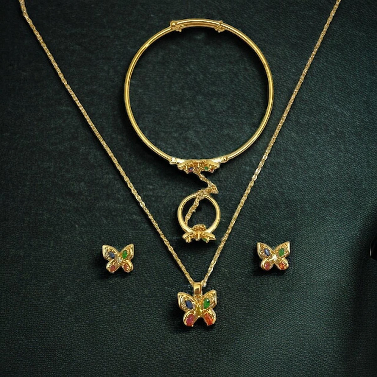 Ethereal Wings: Intricately Crafted Imitation Gold Jewelry Set Adorned with Butterfly Designs and Vibrant Gemstones
