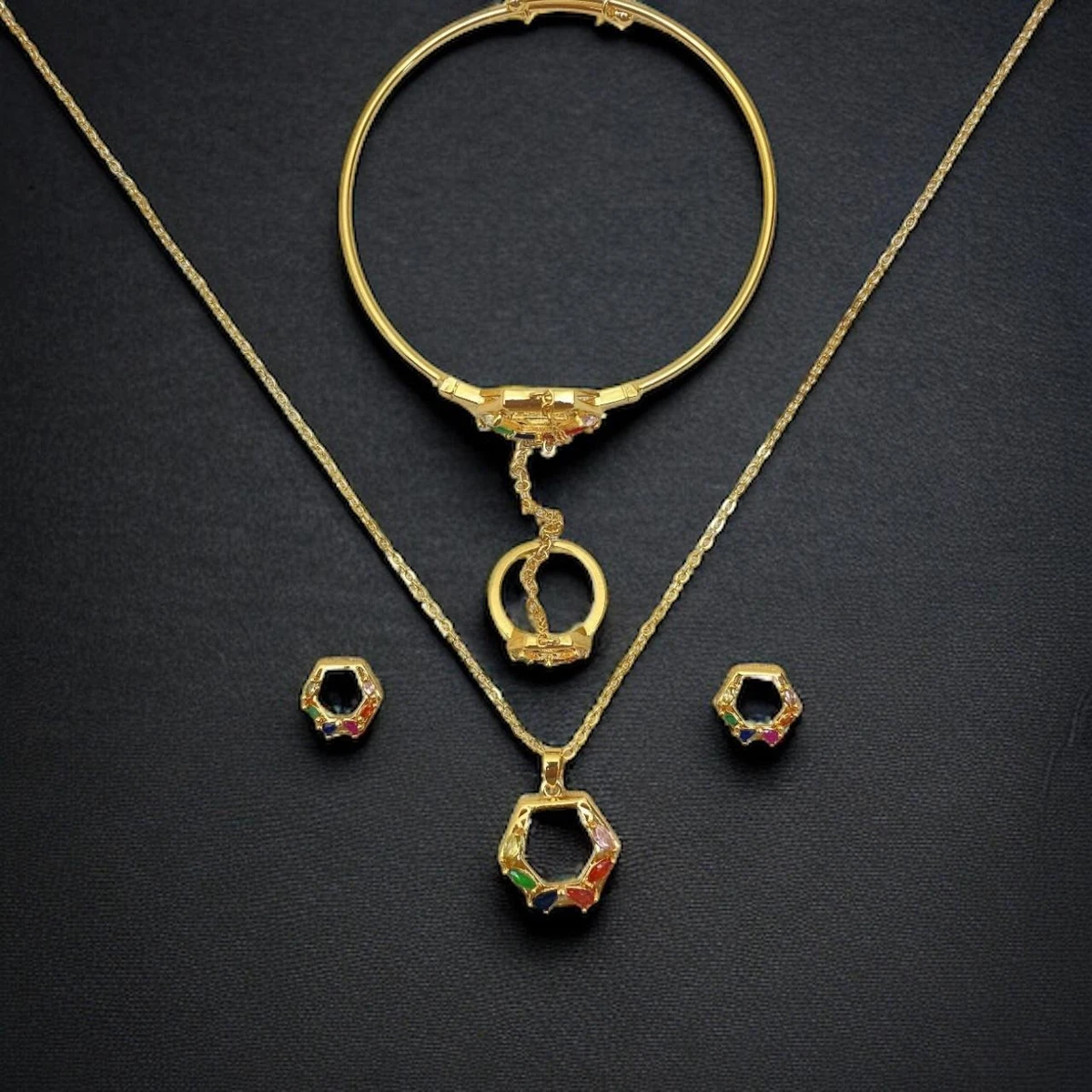 Luminescent Tapestry: A Radiant Symphony of Gold and Vivid Gemstones Adorning this Exquisite Jewelry Set