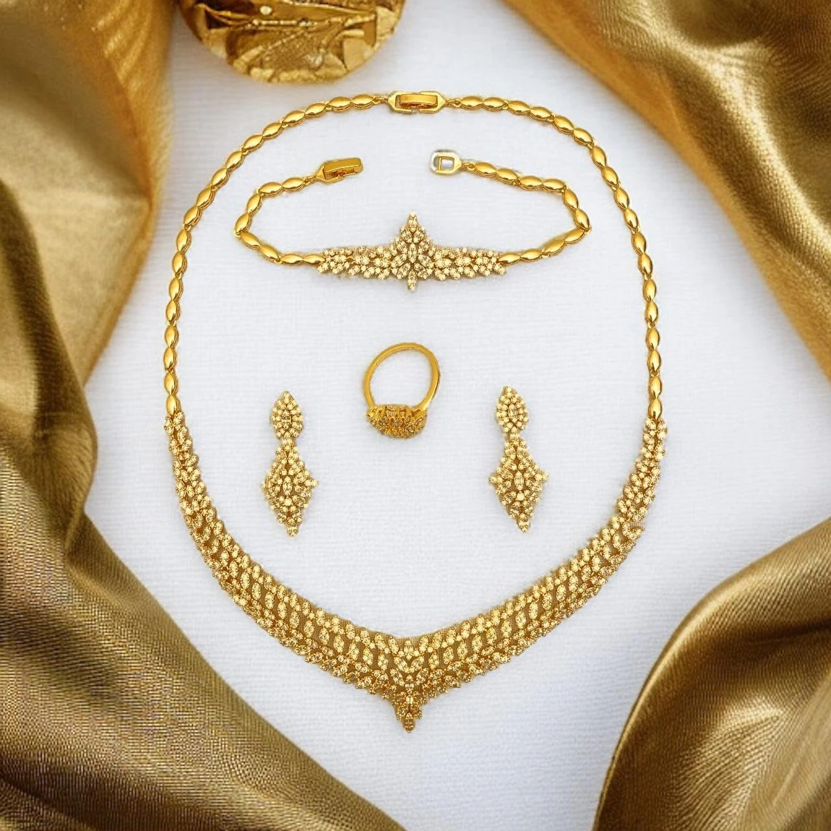 A Captivating Ensemble of Golden Jewelry, Radiating Intricate Design, Radiant Glow, and Illuminating Elegance