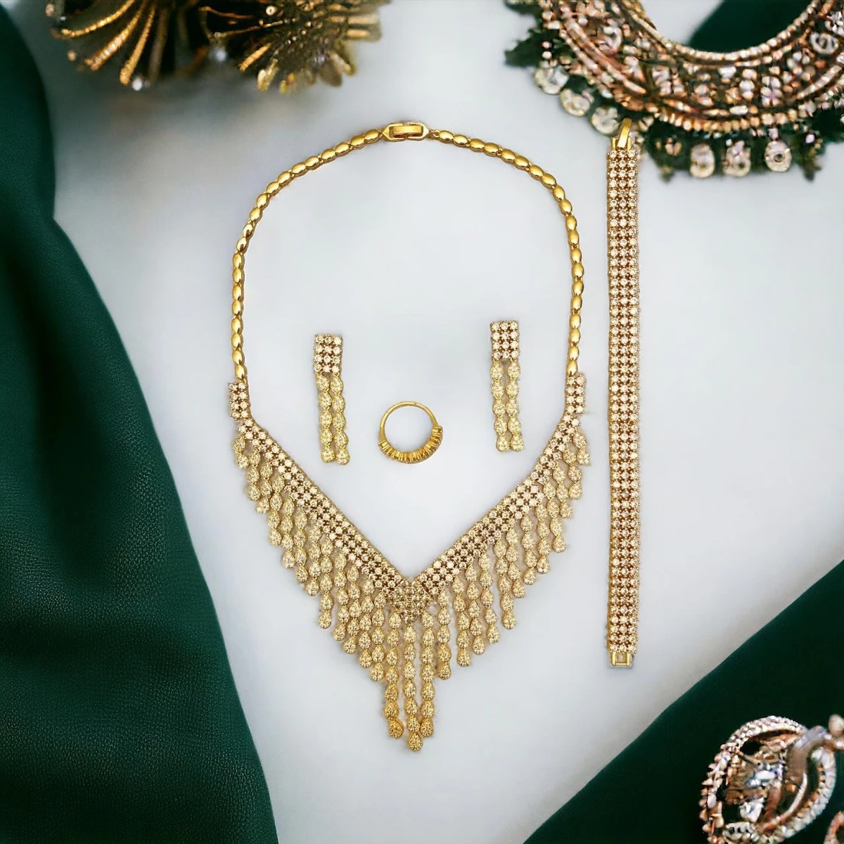 Luxe Elegance: An Exquisite Ensemble of Elegant Imitation Gold Jewelry, Perfectly Crafted for Special Events and Formal Occasions
